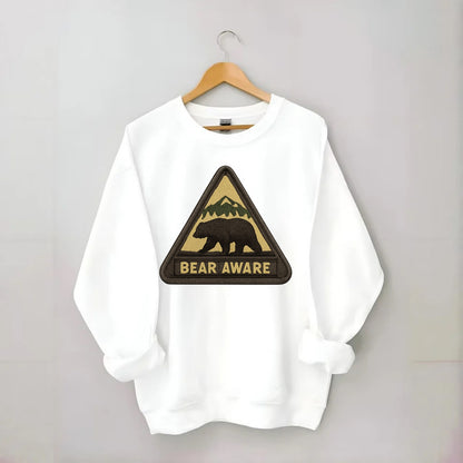 BEAR AWARE - bear silhouette warning in brown and yellow , wilderness safety - Crewneck Sweatshirt - white