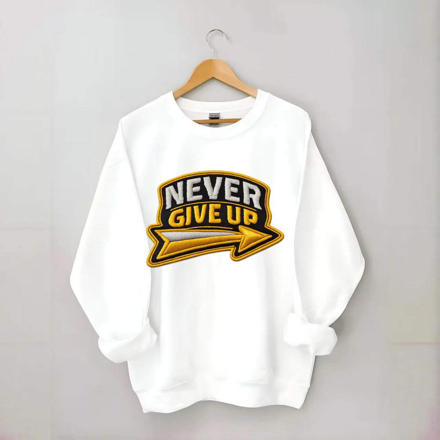 NEVER GIVE UP - bold text with arrow in gold , determination - Crewneck Sweatshirt - white