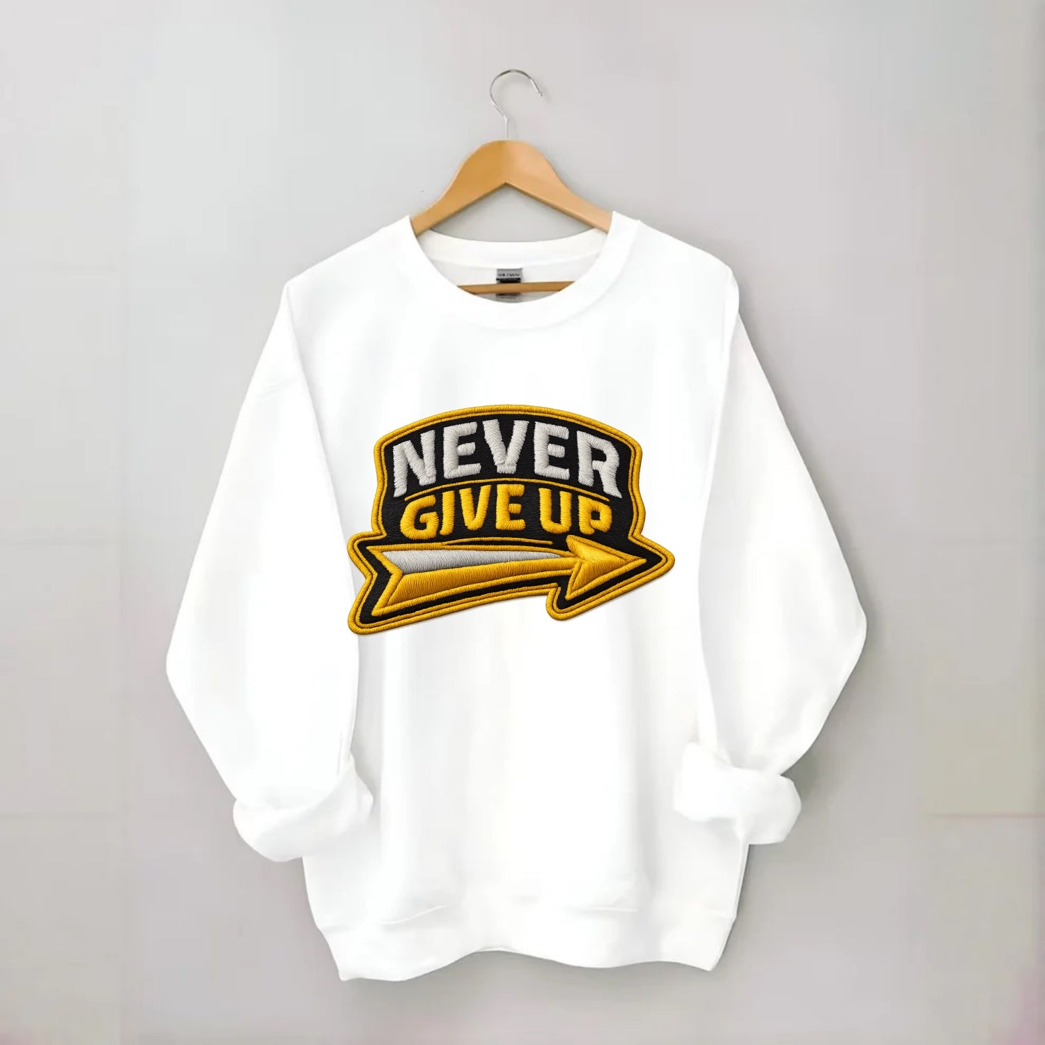 NEVER GIVE UP - bold text with arrow in gold , determination - Crewneck Sweatshirt - white