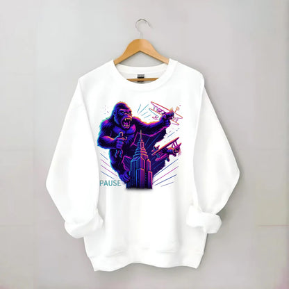 giant gorilla on top of skyscraper holding small figure, swatting planes - Crewneck Sweatshirt - white