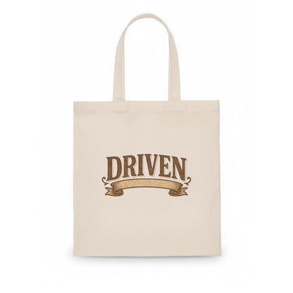 Bold typography design - "DRIVEN" - motivated, focused on goals - Tote Bag - white
