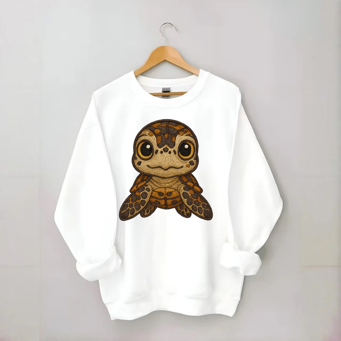 Baby Hawksbill Turtle - amber and brown shell pattern, curious golden eyes, - Crewneck Sweatshirt - white