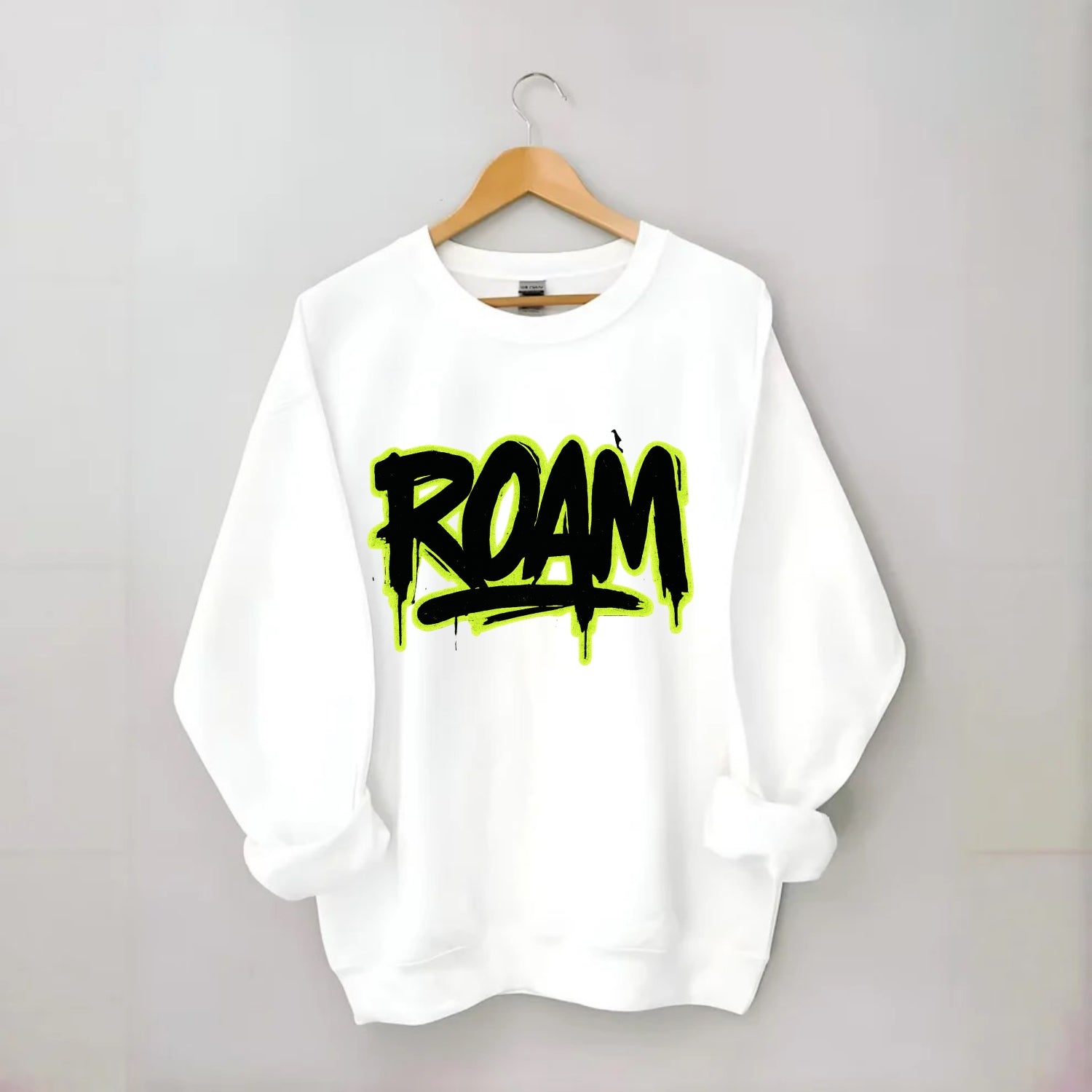 Bold typography design - "ROAM" - wander freely, no destination needed - Crewneck Sweatshirt - white
