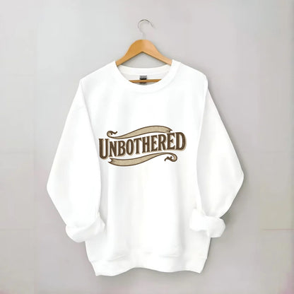 Bold typography design - "UNBOTHERED" - not affected, staying calm - Crewneck Sweatshirt - white