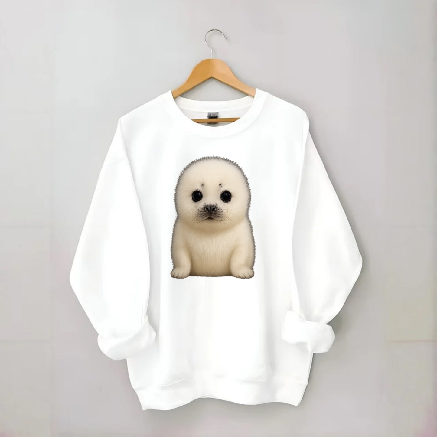 Baby Harp Seal - pure white fluffy fur, enormous dark eyes, front-facing, - Crewneck Sweatshirt - white