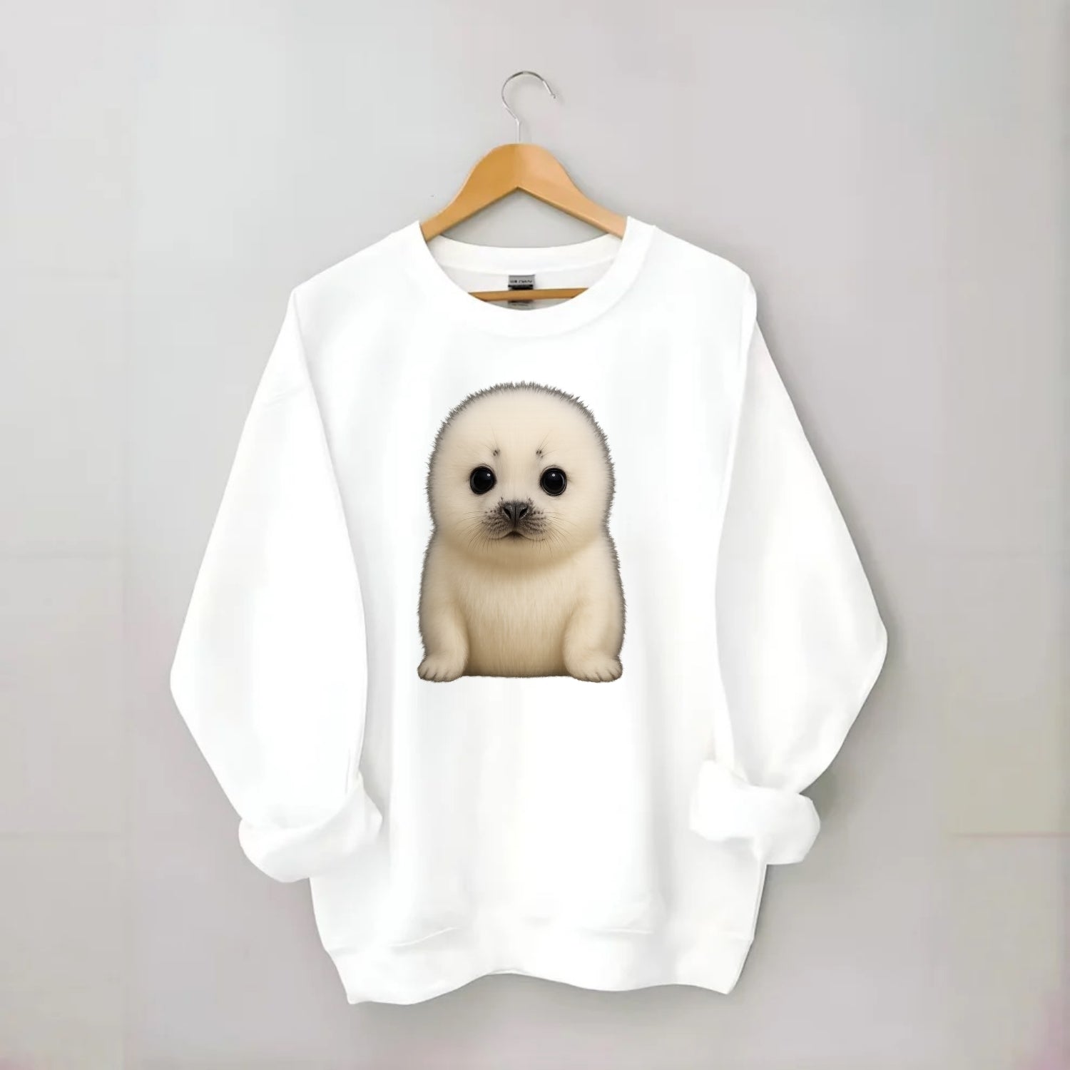 Baby Harp Seal - pure white fluffy fur, enormous dark eyes, front-facing, - Crewneck Sweatshirt - white