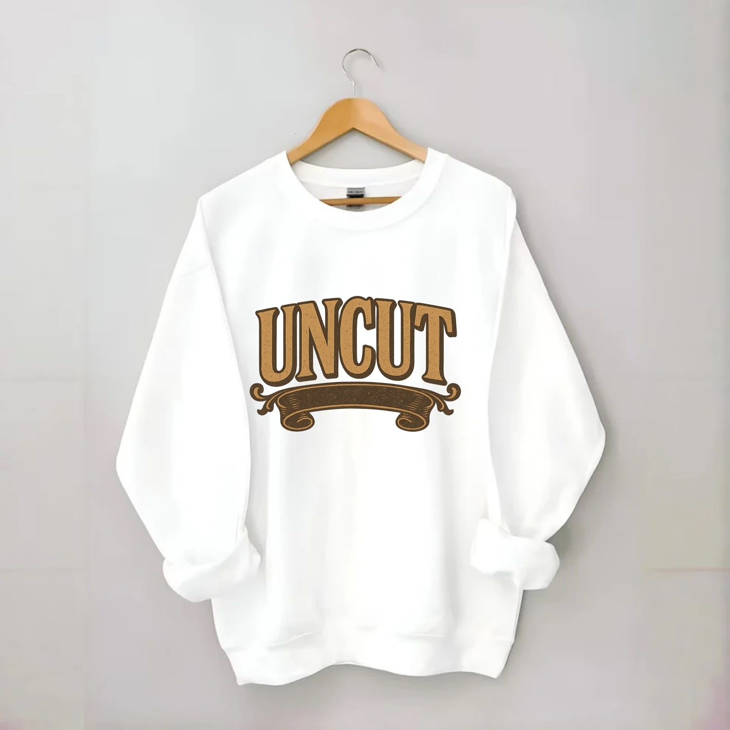 Bold typography design - "UNCUT" - pure, undiluted, authentic - Crewneck Sweatshirt - white