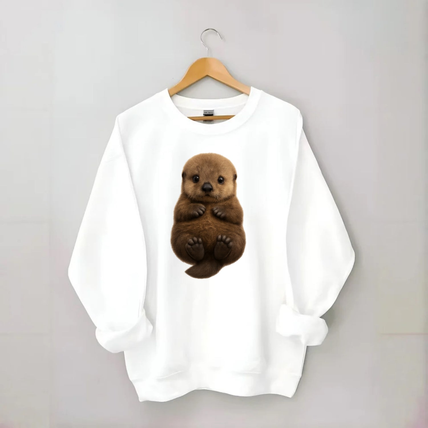Baby Sea Otter - brown fluffy, floating on back, tiny paws, bright eyes, - Crewneck Sweatshirt - white