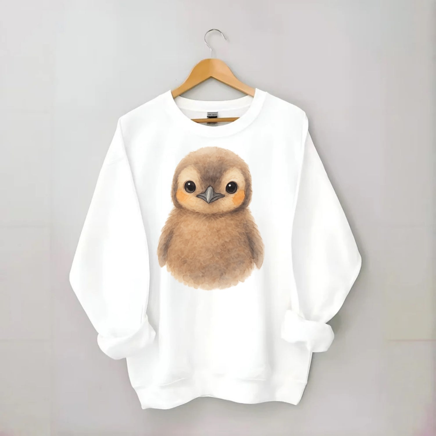 Baby King Penguin - orange cheek patches, fluffy brown, large eyes, - Crewneck Sweatshirt - white