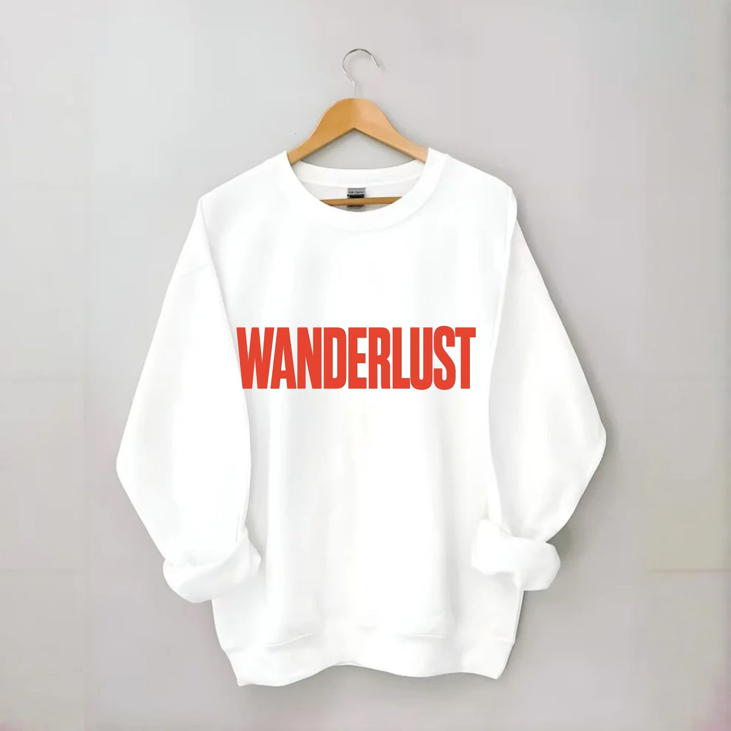 Bold typography design - "WANDERLUST" - desire to travel, explore the world - Crewneck Sweatshirt - white