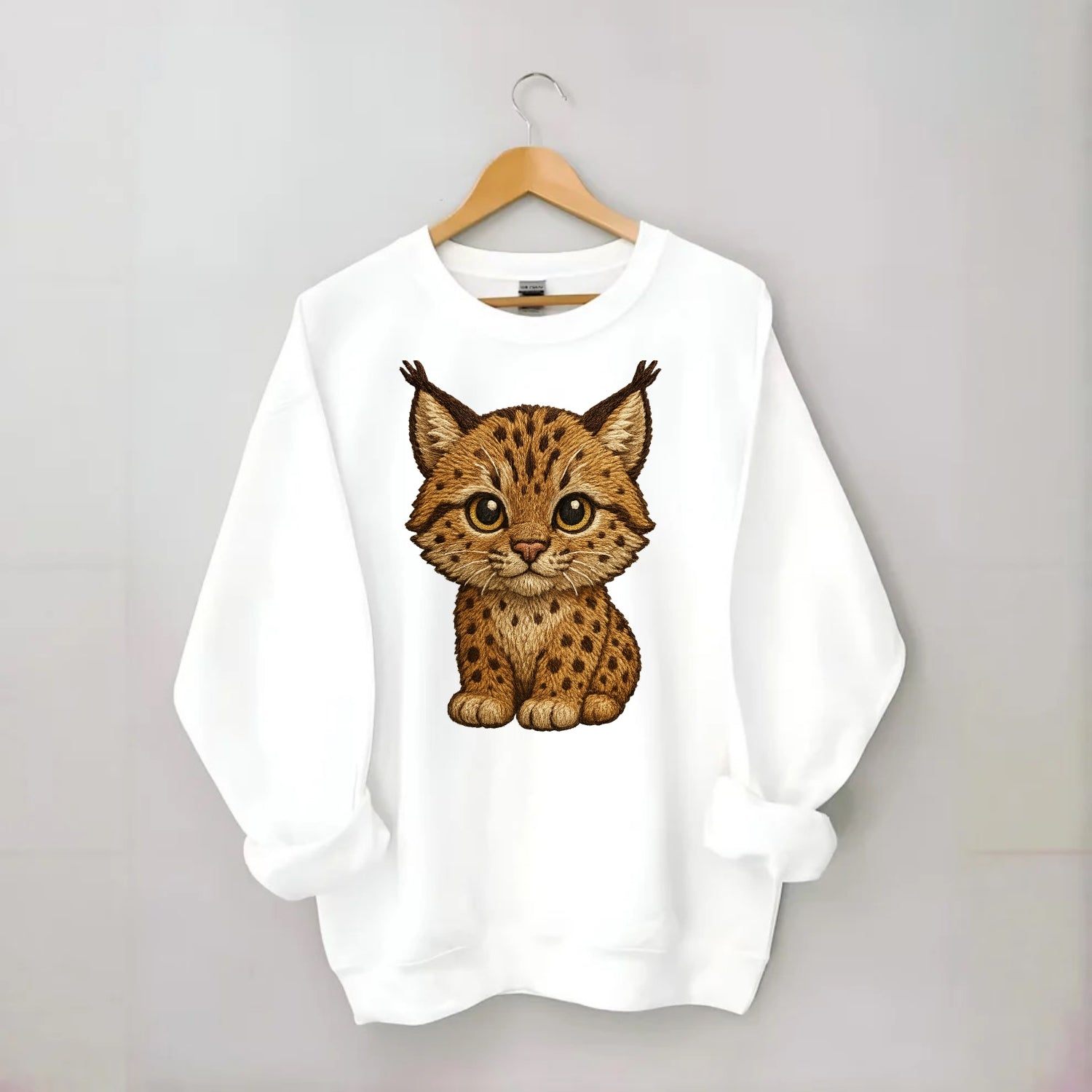 Baby Lynx Cub - tufted ears, spotted fur, golden eyes, front-facing, wild baby - Crewneck Sweatshirt - white