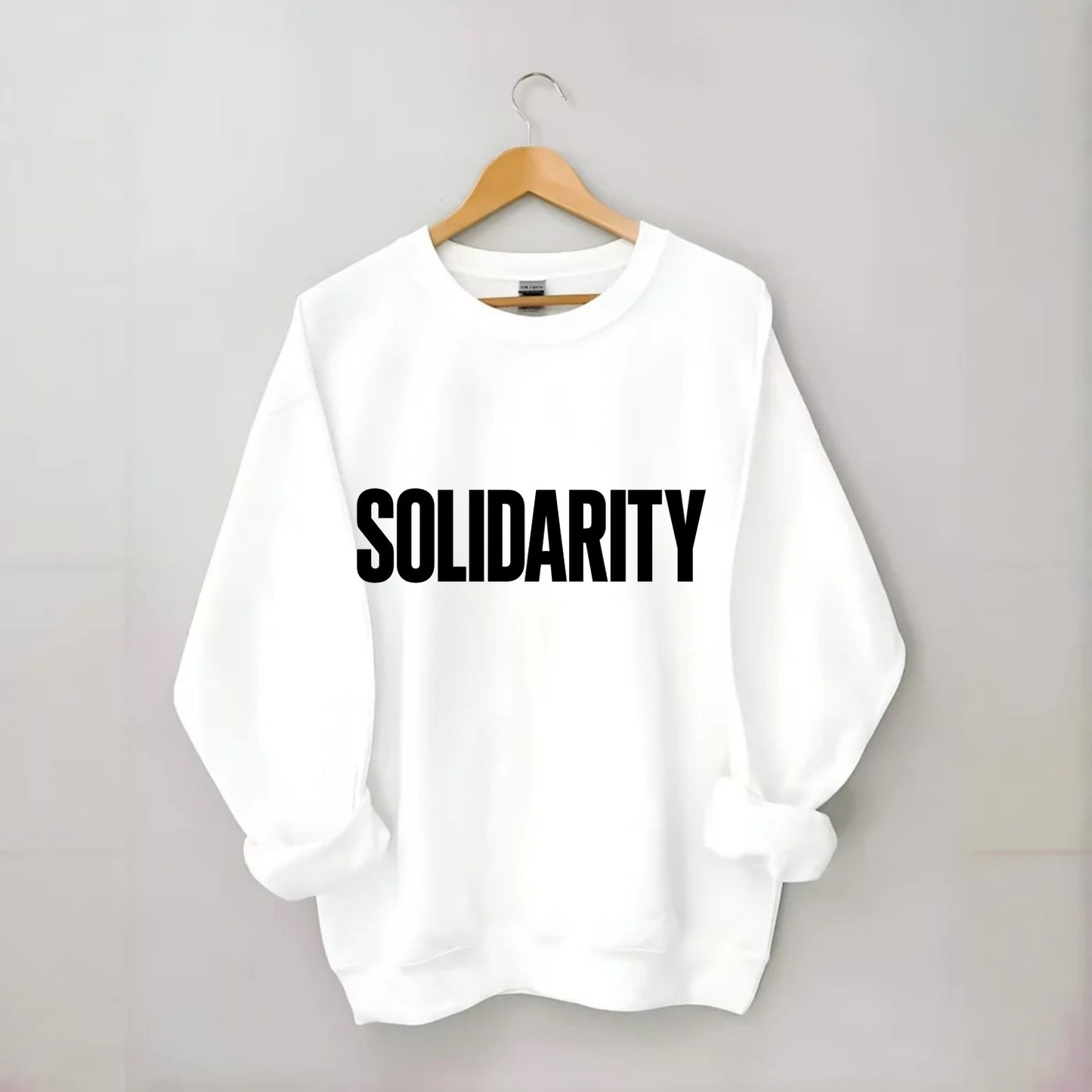Bold typography design - "SOLIDARITY" - standing together, support - Crewneck Sweatshirt - white