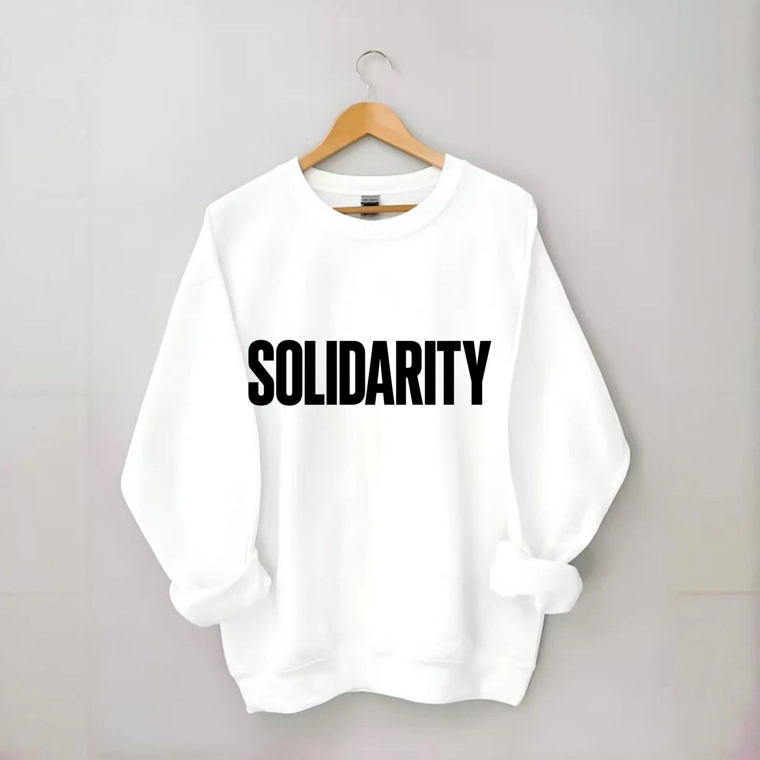 Bold typography design - "SOLIDARITY" - standing together, support - Crewneck Sweatshirt - white