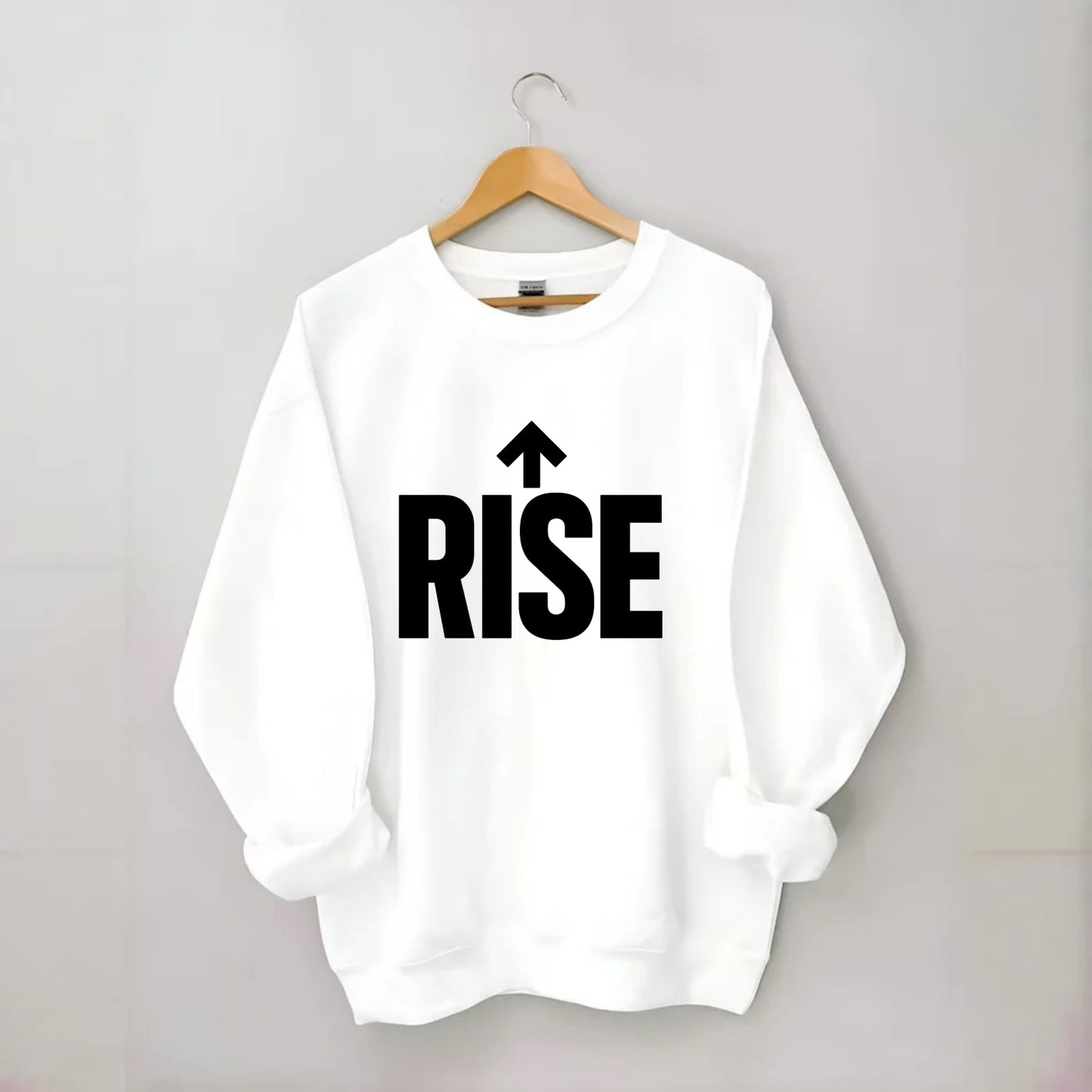 Bold typography design - "RISE" - getting up, ascending, elevating - Crewneck Sweatshirt - white