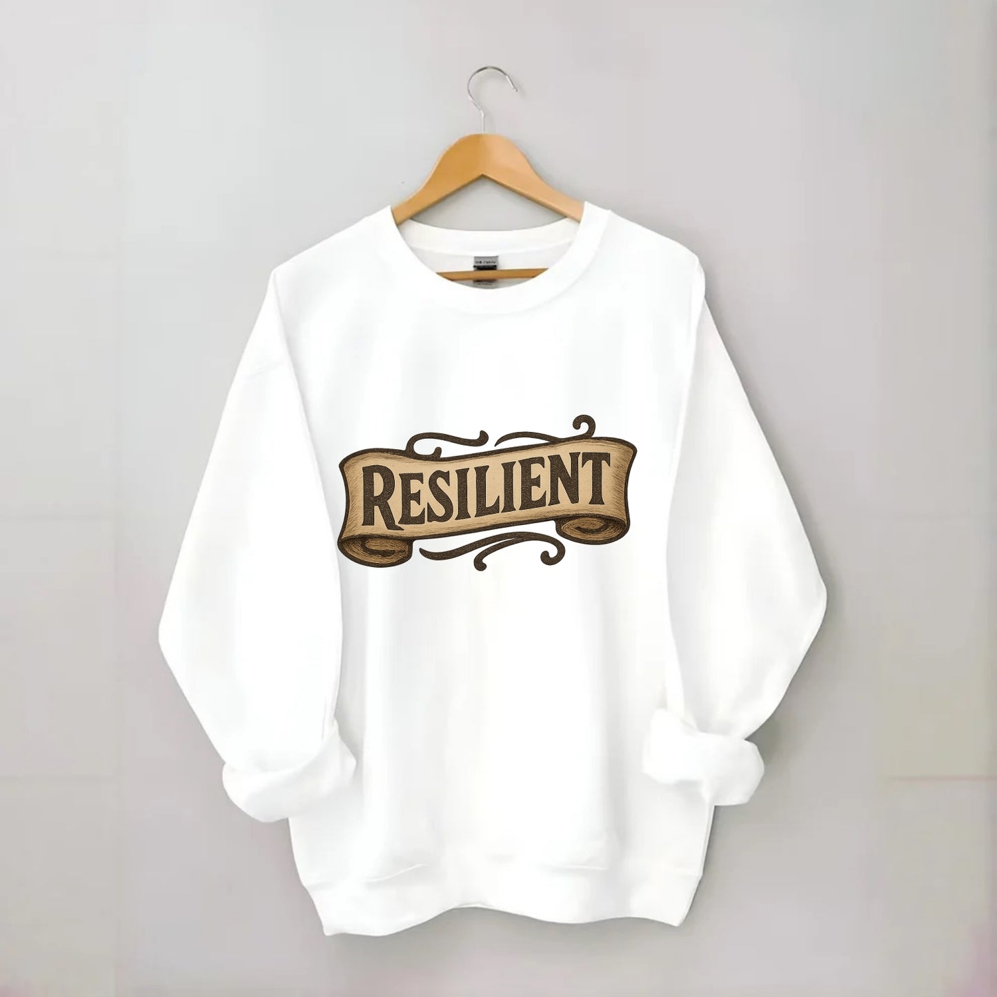 Bold typography design - "RESILIENT" - bouncing back, unbreakable spirit - Crewneck Sweatshirt - white