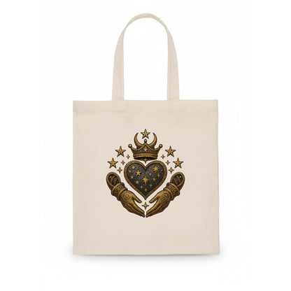 Weathered antique brass crown above a hammered gunmetal heart framed by ivy-woven hands. - Tote Bag - white
